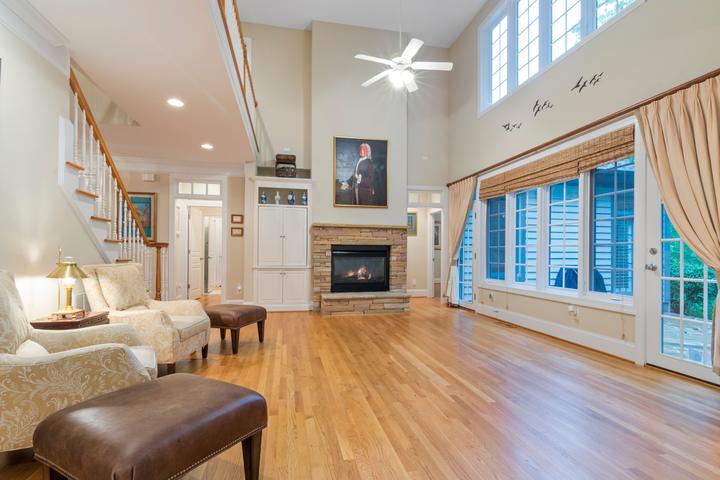 Fireplace set into a pale wall in a furnished living space