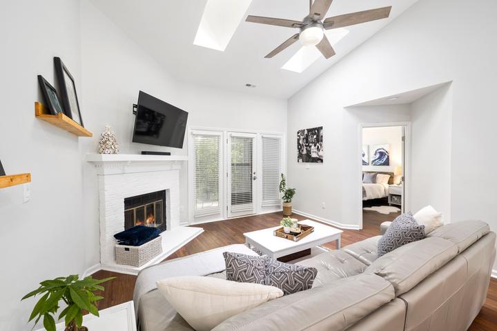Fireplace and mantel in a furnished living room